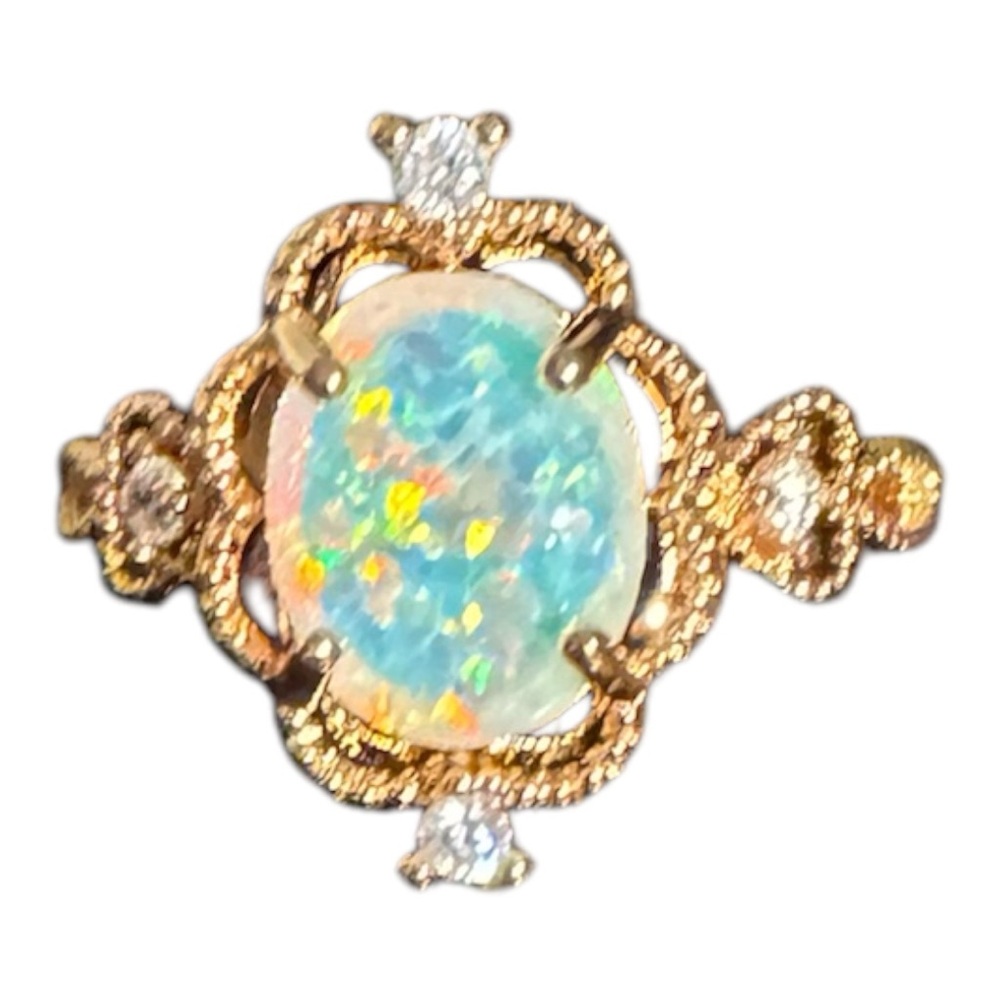 NWOT Rose Gold simulated opal ring size 7.